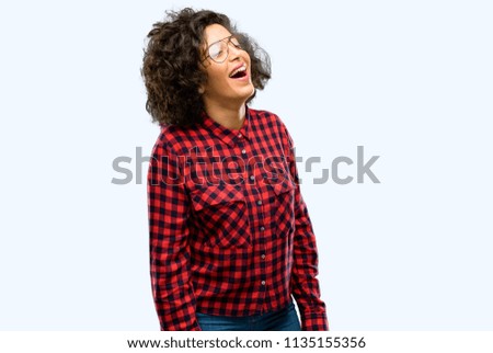 Beautiful arab woman confident and happy with a big natural smile laughing