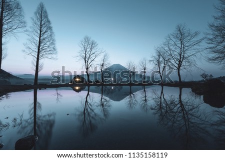 beautiful landscape trees reflections in river and fuji mountain background at fumotoppara camp sites fujinomiya Shizuoka Japanese and picture style 