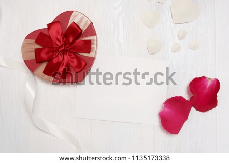Mockup Letter with a gift in the form of a heart and a rose of roses. greeting card for Valentines Day with place for your text. Flat lay, top view photo mock up