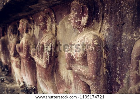 statue buddha on wall temple sukhothai history park in thailand