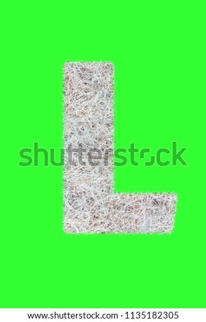 Fonts and Alphabet From Drygrass or Hay Isolate on Green.L. Royalty-Free Stock Photo #1135182305