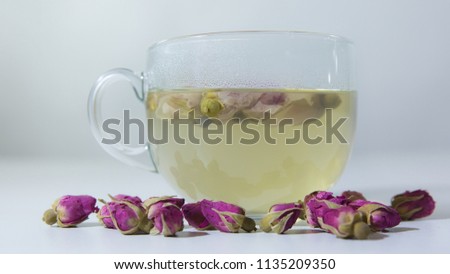 Tea EvaDia Mei Gui Hua Bao, Rose buds close-up. Flower and herbal tea, Mei Gui Hua. This category can also be called herbal infusions, or tisanes. A floral, exotic tea. Wellness and Detox.  Royalty-Free Stock Photo #1135209350