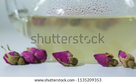 Tea EvaDia Mei Gui Hua Bao, Rose buds close-up. Flower and herbal tea, Mei Gui Hua. This category can also be called herbal infusions, or tisanes. A floral, exotic tea. Wellness and Detox.  Royalty-Free Stock Photo #1135209353