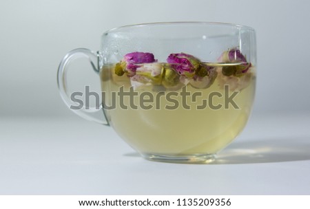 Tea EvaDia Mei Gui Hua Bao, Rose buds close-up. Flower and herbal tea, Mei Gui Hua. This category can also be called herbal infusions, or tisanes. A floral, exotic tea. Wellness and Detox.  Royalty-Free Stock Photo #1135209356