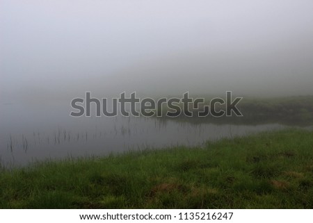 Foggy weather over glacial lake in Jablanica Mt (Macedonia)
