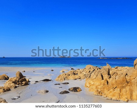 Rocks at the deep blue sea
