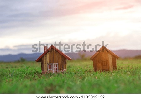 wooden house on grass
