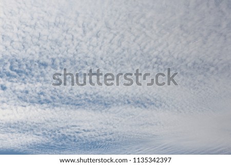 Beautiful atmospheric clouds against a blue sky.