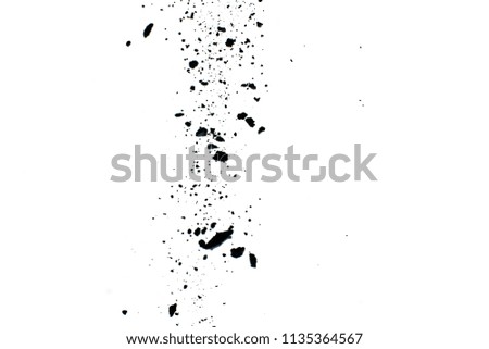 particles of charcoal on white background,abstract powder splatted background.Freeze motion of black powder exploding or throwing black powder.
