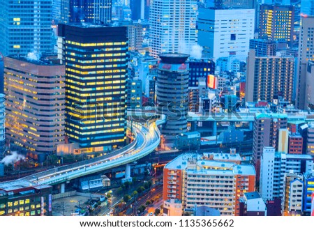 A view of the modern city of Osaka and modern traffic of Japan