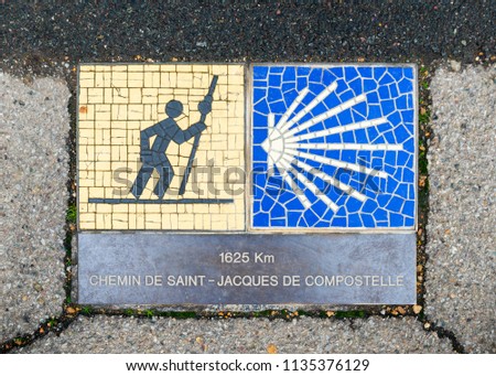 Camino de Santiago pilgrimage sign in Chartres, France. The sign reads: 1625 km Way of St James.
