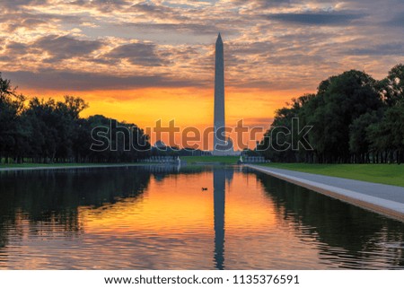 Beautiful sunrise at Washington DC.Dawn reflects Washington Monument in new reflecting pool by Lincoln Memorial, Washington DC, USA.