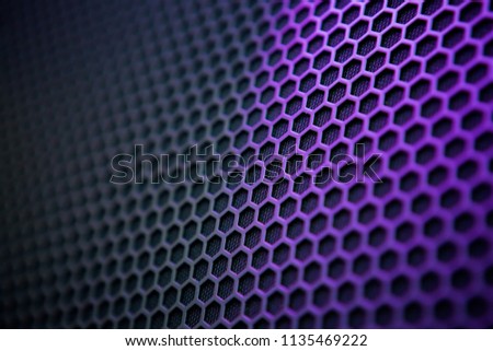 Background image with a three-dimensional hexagonal texture and multi-colored backlight. Image for design and as Wallpaper.