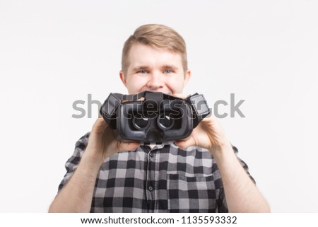 picture of VR glasses with happy men on background