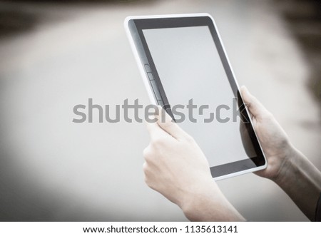 people and technology .closeup of person holding digital tablet