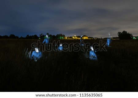 ghostly silhouette of a man at night at a long exposure