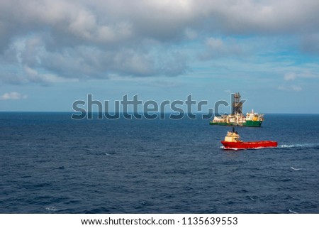 Area of work offshore on the high seas, the oil industry and a beautiful day