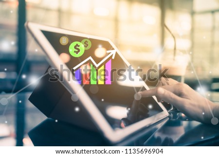 Woman hand using smartphone or tablet to do business, financial or trading stock forex market  with cafe bokeh vintage color tone background.