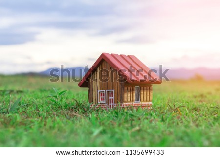 wooden house on grass