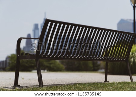 Park Bench with Philadelphia Skyline in Background at Drexel Park