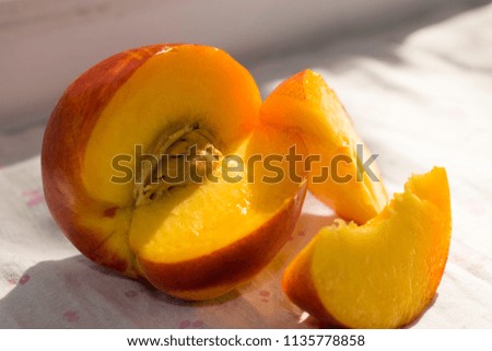 Juicy peach cut into pieces