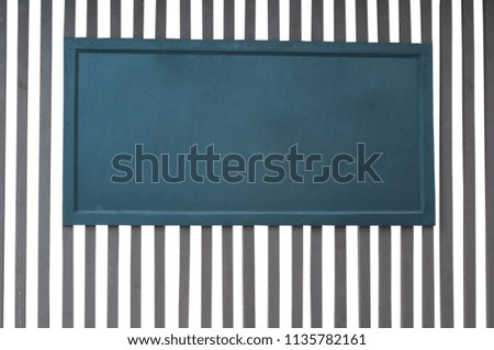 Image of blackboard against on fence. isolated background