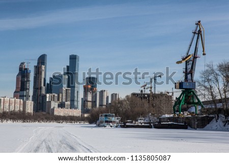 "City" and the industrial area around are the most famous modern sight of Moscow. Futuristic skyscrapers are standing on the riverside of the icebound Moscow River and shining on the sun.