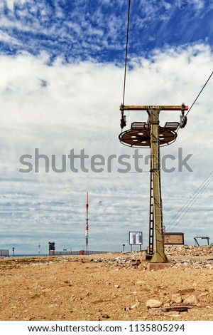 Tower of a ski lift on top of the Ylläs fjell in the Finnish Lapland. The link tower in the background makes the place look like Mos Eisley.
