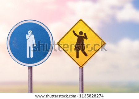 Success and loss, happy and sad, optimism and pessimism - a shy man and a dancing woman. Road signs.
