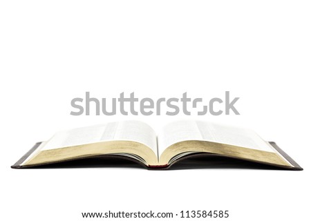 Open bible book isolated on white background