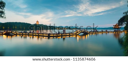 Landscape of West Lake（xihu）Hangzhou. Long Bridge and Leifeng Pagoda. Located in Hangzhou City, Zhejiang Province, China. Royalty-Free Stock Photo #1135874606