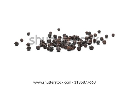 Black pepper pile, peppercorn isolated on white background