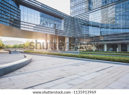 Modern urban architecture and road traffic Royalty-Free Stock Photo #1135913969