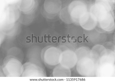 Blurred gray bokeh background texture from natural