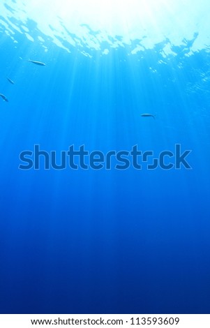 Abstract Underwater Blue Background with sunbeams