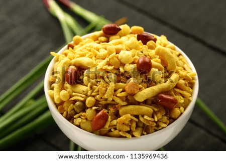 Indian sweet and salt mixture -Khatta meeta in bowl.