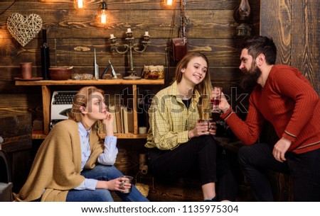 Lady lonely and dreamy spend time with happy couple in love. Couple have fun near lonely woman. Relations and loneliness concept. Woman jealous to couple in love, wooden background.