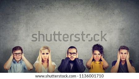 Group of multicultural people women and men covering their ears do not want to listen each other  Royalty-Free Stock Photo #1136001710