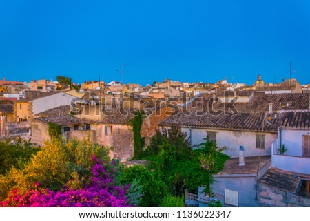 Sunset view of the old town of Alcudia, Mallorca, Spain
