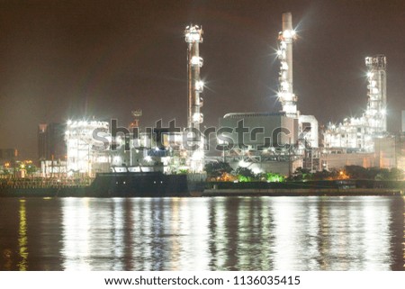a standard and eco-friendly refinery, surrounded by rivers and sky, covered with clouds