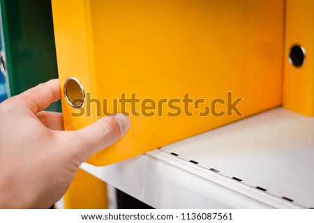 Closeup image of office shelves paperwork dossier binder background. Manage organization accountancy, financial bureaucracy, workplace guidelines, education university knowledge organizer