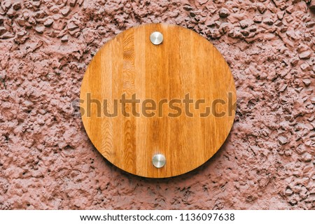 Wood round board on the wall