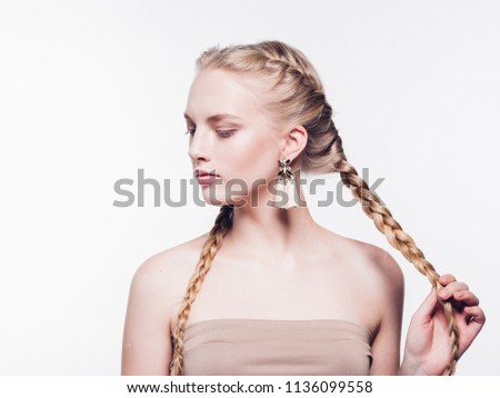 Woman with pigtails beauty healthy skin isolated on white blonde female