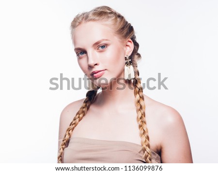 Woman with pigtails beauty healthy skin isolated on white blonde female