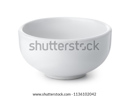 White empty ceramic bowl isolated on white Royalty-Free Stock Photo #1136102042