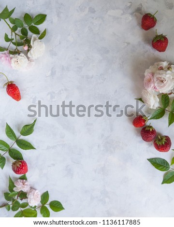 Copy space with roses and strawberries