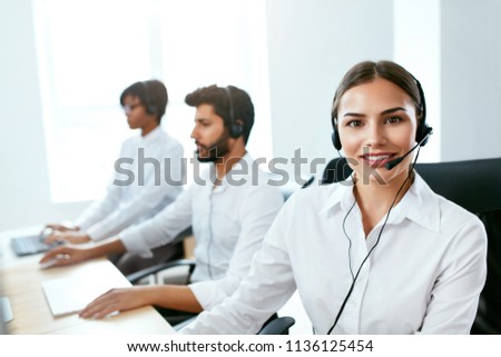Call Center Agent Ð¡onsulting Client Online  Royalty-Free Stock Photo #1136125454