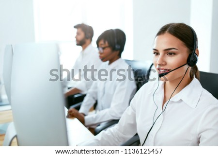 Call Center Agent Ð¡onsulting Client Online  Royalty-Free Stock Photo #1136125457