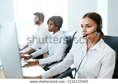 Call Center Agent Ð¡onsulting Client Online  Royalty-Free Stock Photo #1136125460