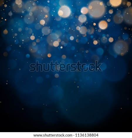 Blurred bokeh light on dark blue background. Christmas and New Year holidays template. Abstract glitter defocused blinking stars and sparks. EPS 10 Royalty-Free Stock Photo #1136138804